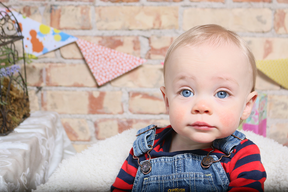 Little boy posing during an Easter portrait session