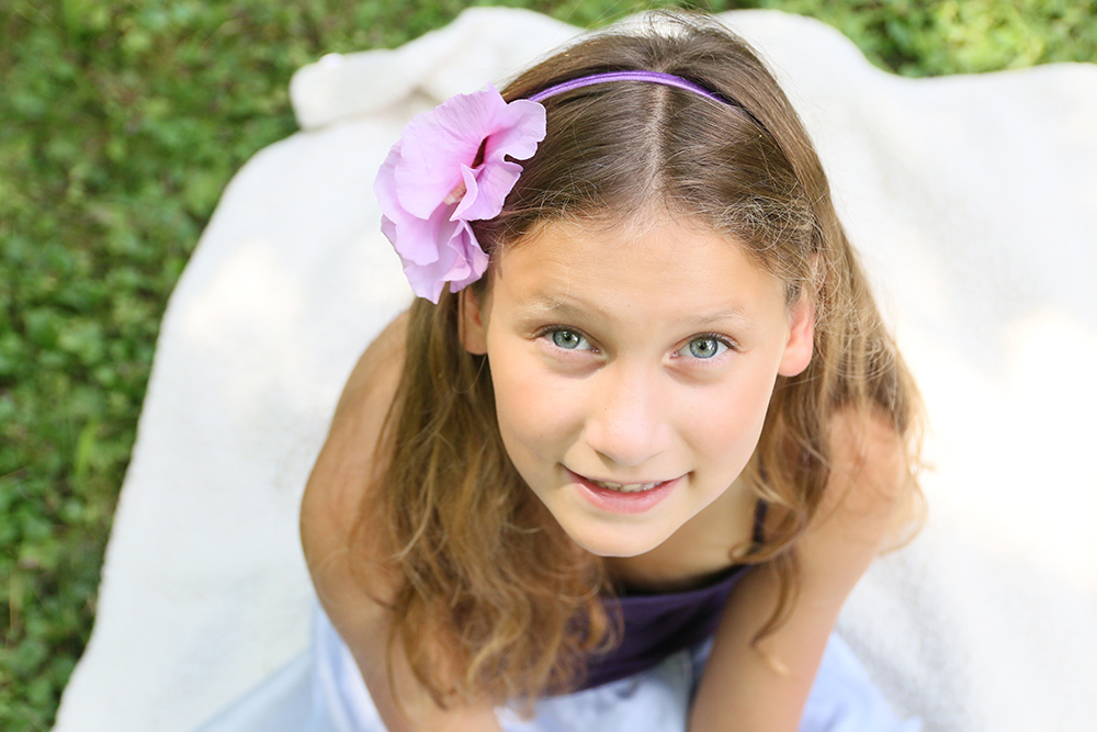 Young girl in pretty dress for a child photography Session 