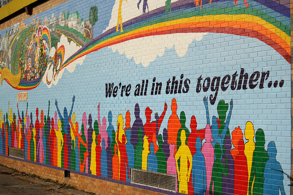 We're all in this together mural in Lansing Michigan