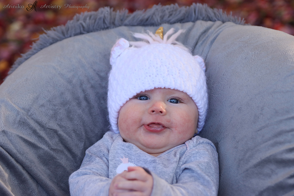 Baby Cadence blowing raspberries