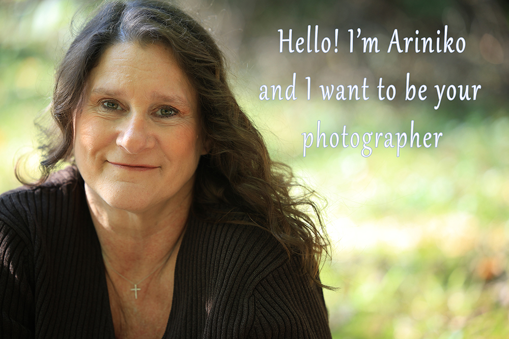 Ariniko smiling at the camera asking to be your photographer