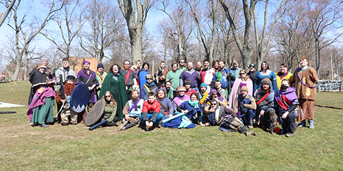group of people who play amtgard posing in a group shot