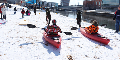 Ice carving in downtown Lansing for the 2022 Winterfest