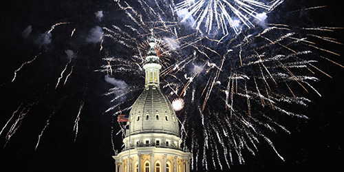 Fireworks over Michigan State Capitol During Silver Bells festival