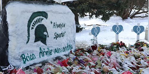 painted rock with Spartan Strong