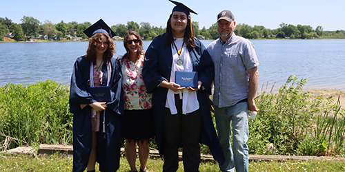 O'Meara Twins celebrating their graduation from Haslett High School