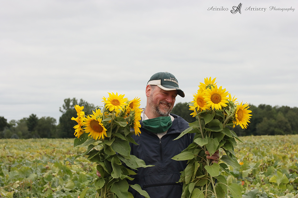 Pat with sunflower bunches