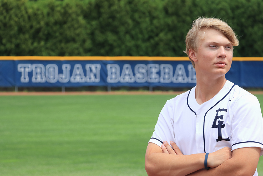 young man standing in a baseball field in East Lansing, Michigan
